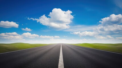 Fototapeta premium Endless asphalt highway stretching through grassy hills under serene sky