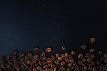 Scattered coffee beans on the side