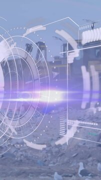 Animation of scanning interface screen over birds flying around bulldozer and garbage at landfill