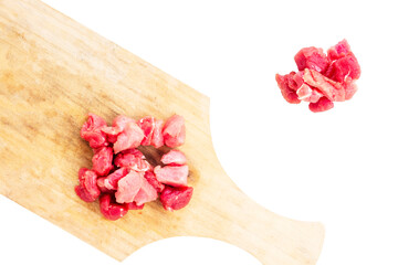 top view of slices beef on a cutting board