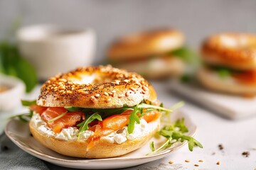 Close up of a delicious everything bagel topped with cream cheese, smoked salmon, and fresh arugula, ready to be enjoyed for a healthy and satisfying breakfast