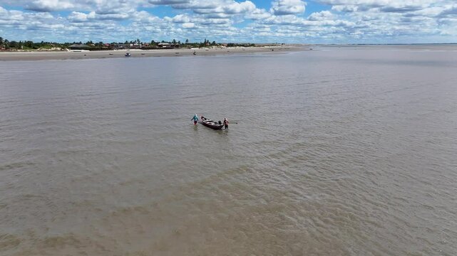 Flight Of The Guaras At Araioses In Maranhao Brazil. Wildlife Landscape. Parnaiba Delta Waterfront. Maranhao Brazil. Sea Birds Animals. Flight Of The Guaras At Araioses In Maranhao. Parnaiba Delta.