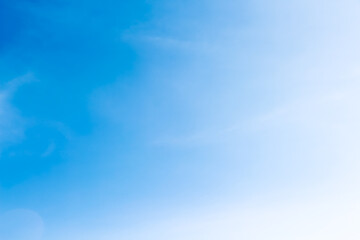 Soft white clouds on bright blue sky  background
