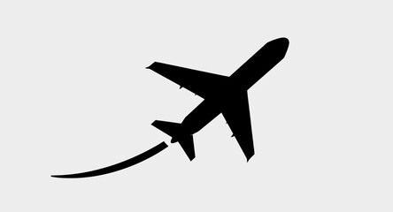 Silhouette of an Airplane Flying Against a Clear Sky with Contrail