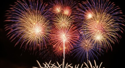 Fototapeta premium Spectacular Night Sky Bursting with Vibrant Fireworks Displays Creating a Mesmerizing Celebration of Light and Color