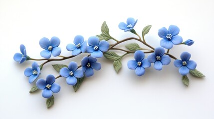 Blue polymer clay forget-me-nots with leaves on a branch on a white background. This image is ideal for romantic designs or spring season illustrations.