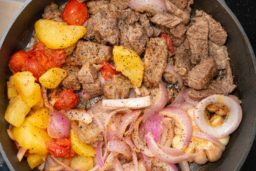 top view fresh home cooked beef dices on a pan