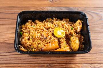 angle view box of seafood fried rice at horizontal composition