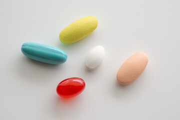 Colorful medicine pills tablet on white background