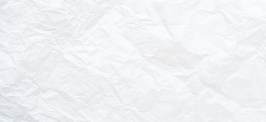 Top view and full frame of wrinkled or crumpled white paper texture used as crumpled white paper background texture in decorative art work