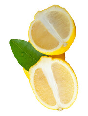 Top view of ripe yellow lemon fruit with two oval or ellipse halves and green leaf in stack...