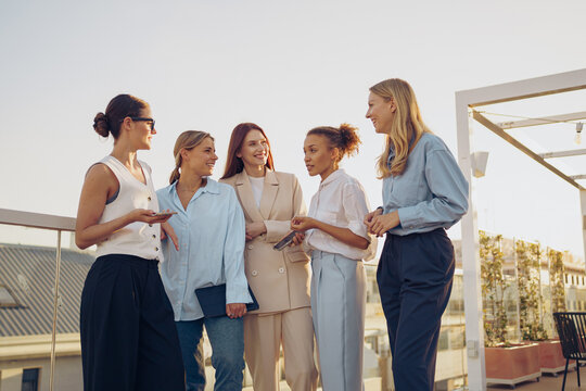 Empowered Women Networking on a Rooftop as part of a larger initiative to inspire and unify