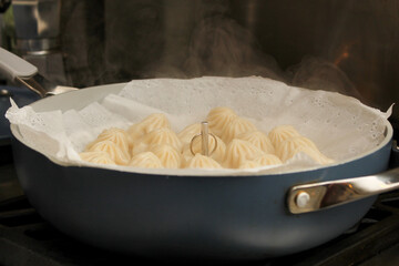 Fresh hot steamed dumplings cooked at home