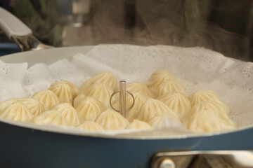 Fresh hot steamed dumplings cooked at home
