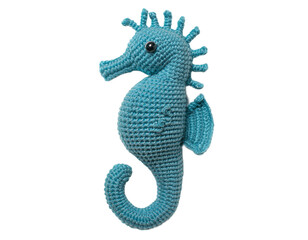 Fototapeta premium A charming crochet seahorse showcases its detailed texture and vibrant blue hue against a stark transparent background.