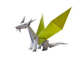 An origami dragon sculpture showcases artistic folding in green and silver, set against a stark background highlighting the intricate details of paper art, transparent background