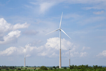 Wind turbines generate electricity for clean energy farms for sustainability