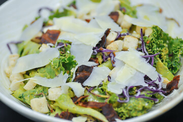 caesar salad or vegetable salad with bacon and cheese