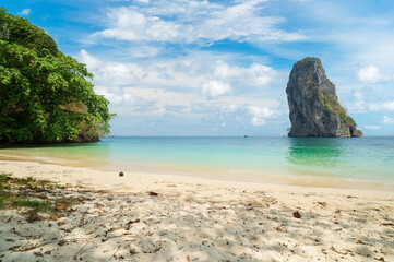 Ko Poda white sand beach and tourist fishing boats on blue sea ocean to marine with natural mountain island for daylight seascape sky and nature landscape to summer holiday travel at Krabi in Thailand