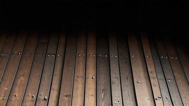 Dark brown wooden panels creating a rustic textured wall background