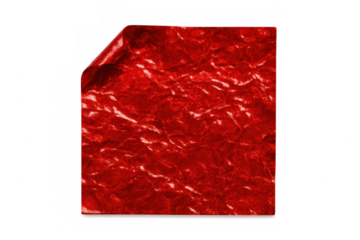 Crumpled red paper with folded edge, showcasing vibrant texture against transparent backdrop
