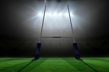 Rugby goalposts with padded bases are standing on striped turf under floodlights in flat design © vectorfusionart