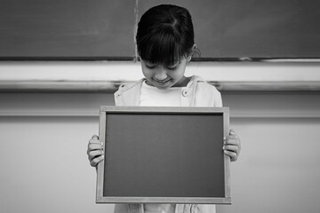 Schoolchild with blackboard