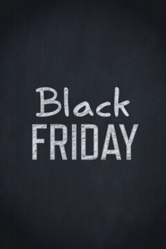 Fototapeta Chalkboard surface is displaying bold white chalking of Black Friday with faint chalk dust marks