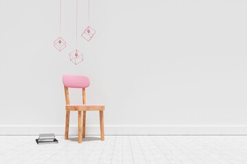 Fototapeta premium Decoration over empty wooden chair and books against wall
