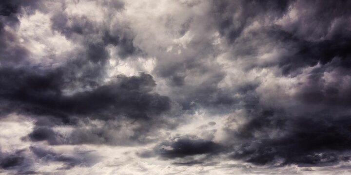 Fototapeta Dense dark grey clouds are being shown in open sky flat design, featuring layered storm patterns