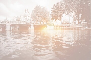 Amsterdam canal bridge with bright light