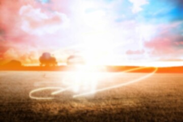 Digital composite image of light trails on field