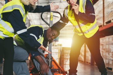 Accident in warehouse. Warehouse worker accident at work during working in warehouse. Industrial...