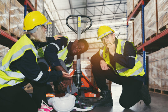 Accident in warehouse. Warehouse worker accident at work during working in warehouse. Industrial accident. Health safe of work and safety first concept