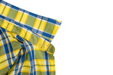 Over worn and torn checkered shirt, obsolete clothes backdrop isolated on white