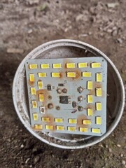 A close-up shot of an electronic device or an LED light component, revealing intricate details of...