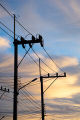 black silhouette of light pole on sky background