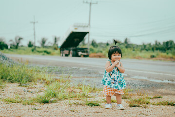 Joyful family moments with baby girl asian childhood adventures nature outdoor playtime