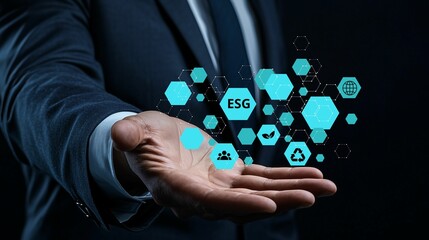 A businessman presenting ESG logo in his open palm. ESG environment social governance investment business concept. 
