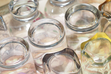 Clear glass jars arranged on a surface for display