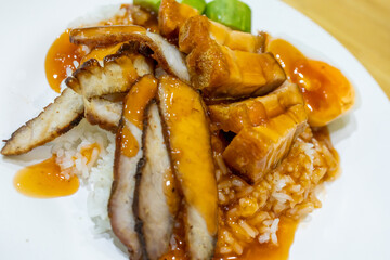 Top view of Red pork and crispy pork rice, focus selective