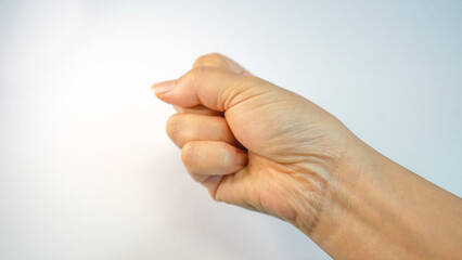Strong Emotion Expressed by Clenched Female Fist