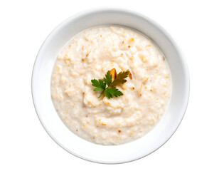 Bowl of creamy oatmeal with garnish