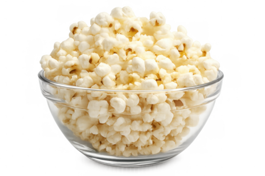 Popcorn overflowing from a glass bowl, isolated on a transparent background, creating the perfect snack for an enjoyable movie night