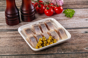 Slided marinated salted herring fillet