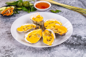 Baked oyster with cheddar cheese