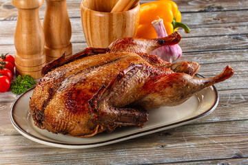 Baked with spices whole duck