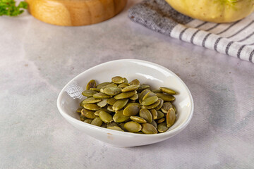 Fresh green pumpkin peeled seeds