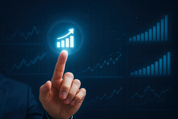 Obraz premium Stock market financial growth concept with hand pointing at glowing rising bar chart symbol showing financial growth and stock market increase