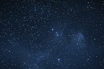 Fototapeta premium Expansive vista of a starlit night canvas creating a serene ambiance